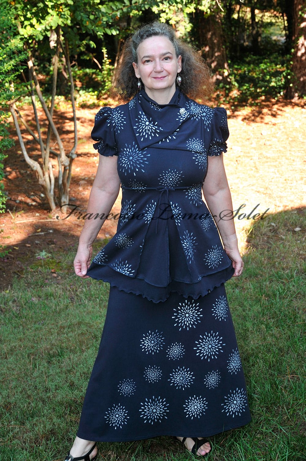 Women's puff sleeve flared tunic handmade with a dark navy cotton lycra jersey that was hand printed with silver metallic stars.