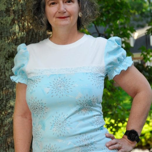 women's wearable art light blue t-shirt with puff sleeves handmade and hand printed