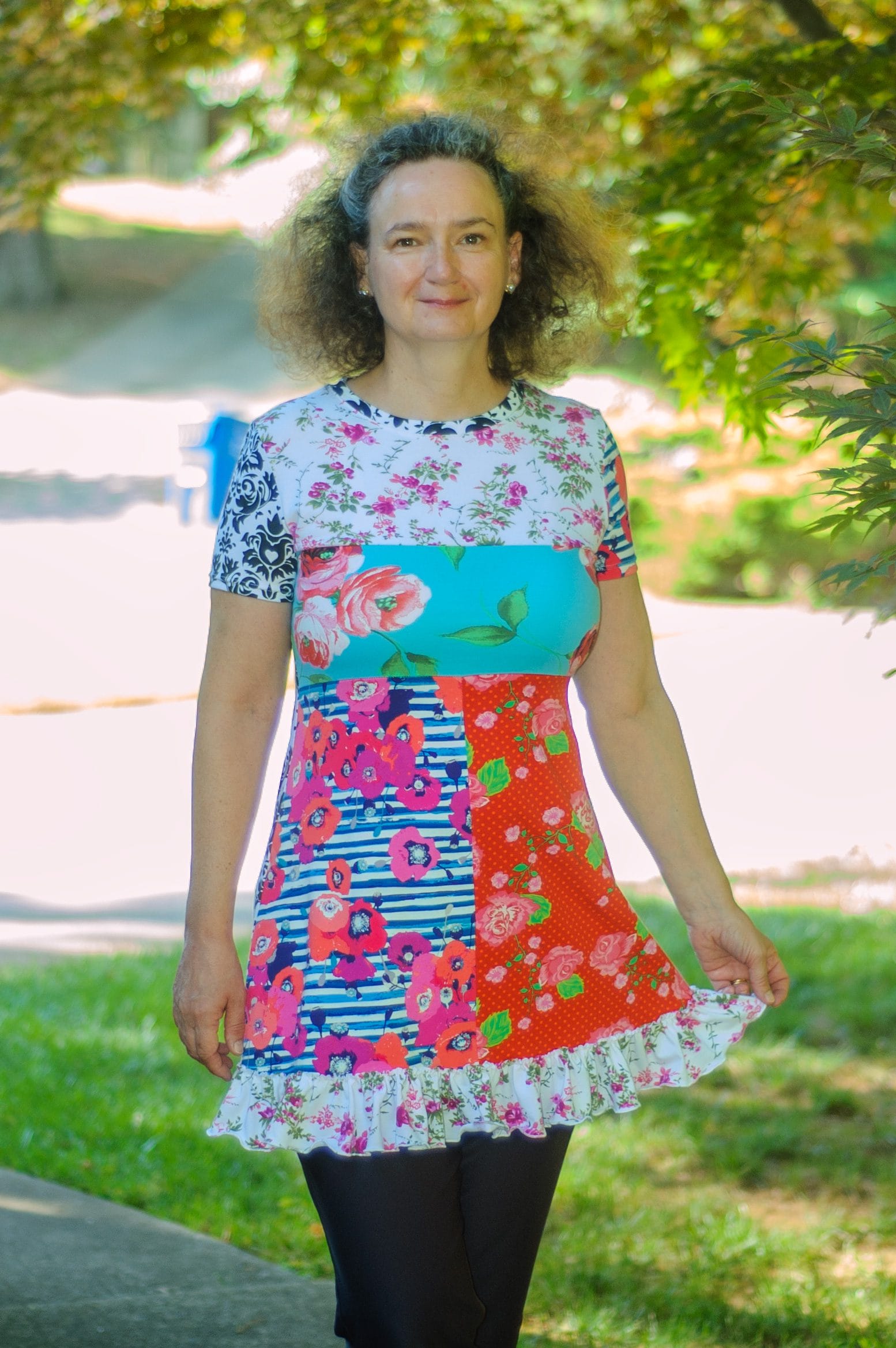 Women's a-line short sleeve tunic handmade with a combination of colorful floral and damask cotton jerseys.