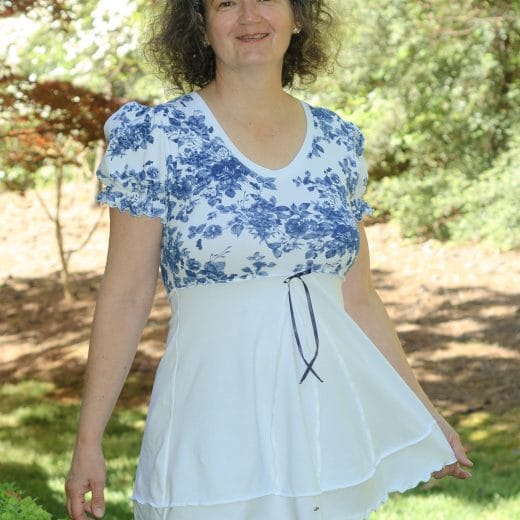 Women puff sleeve floral tunic with empire waist, handmade with a white and a floral blue and white cotton lycra jersey.