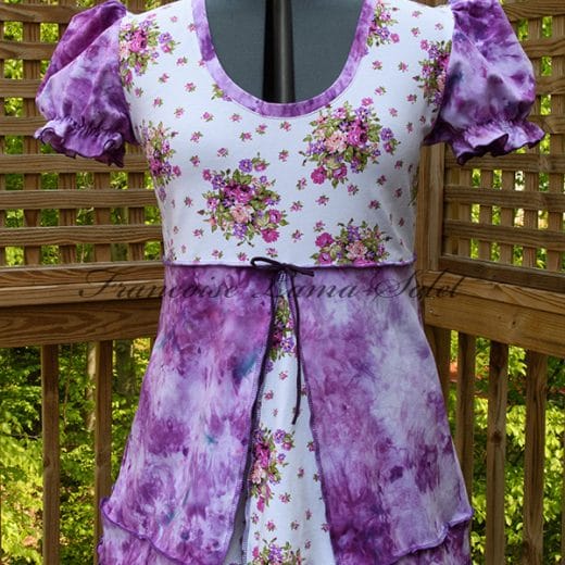 Women's puff sleeve tunic swing top handmade with a floral cotton jersey and a hand dyed purple jersey.