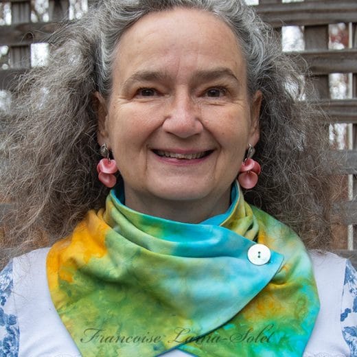 Women button neck scarf handmade and hand dyed in different shades of green, turquoise and marigold.