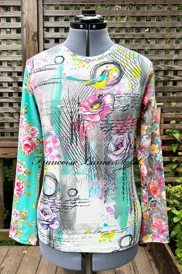 Illuminate your fall and winter wardrobe with this handmade women's floral long sleeve t-shirt. Add a touch of boho chic to your style!