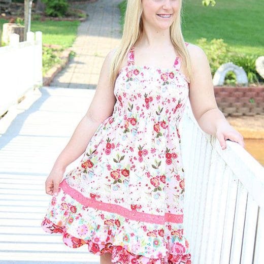 Women's knee length sundress handmade with floral cotton print and lace.