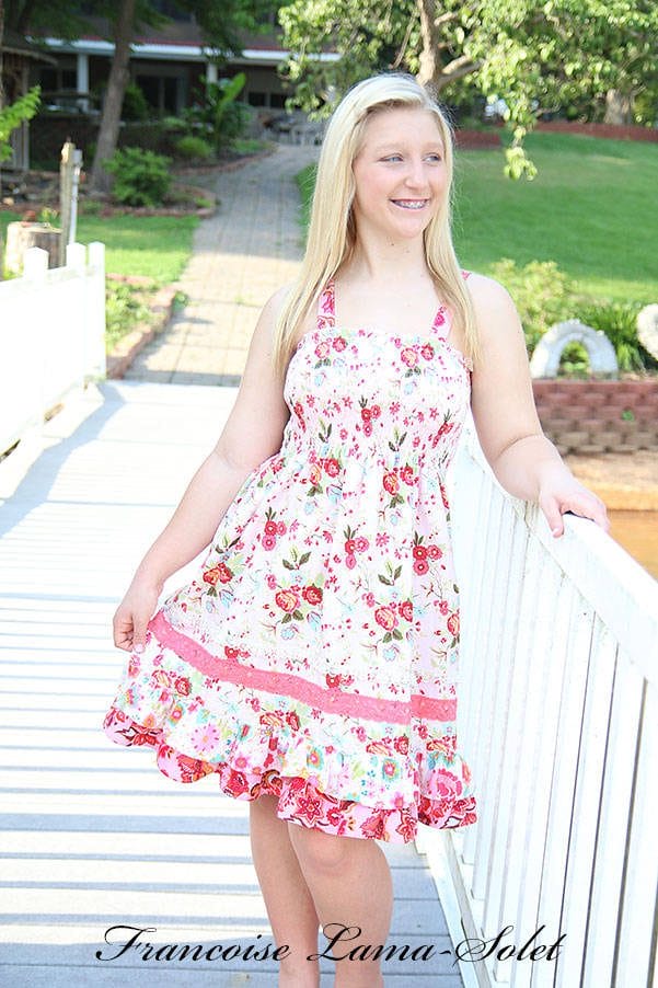 Women's knee length sundress handmade with floral cotton print and lace.