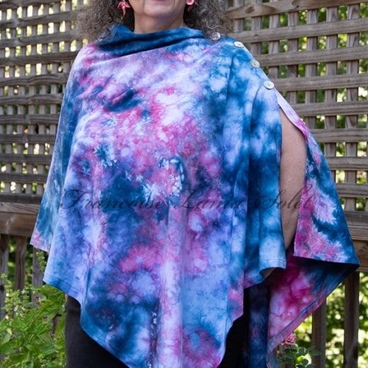 Women's handmade and hand dyed pink and blue poncho shawl.