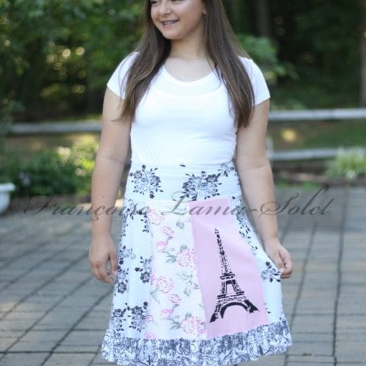 Women's knee length ruffled handmade with pink and grey floral cotton jersey and hand printed with the Eiffel Tower.
