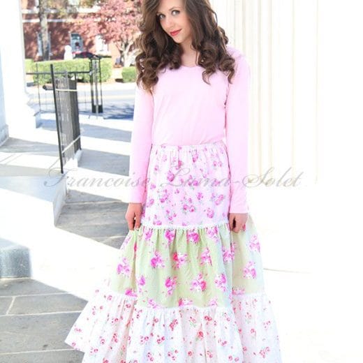 This lovely romantic long tiered skirt is handmade with a mix of pastel cotton jersey and embellished with white lace.