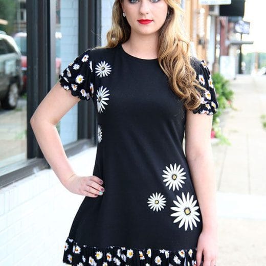 Women ruffle tunic with puff sleeves handmade with a black jersey and a daisy print jersey, and hand printed with white daisy flowers.
