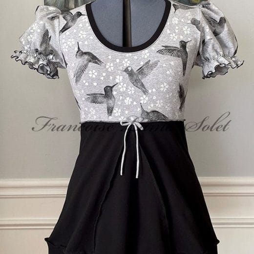 Women's empire waist puff sleeve tunic handmade with gray and black cotton lycra jerseys and hand printed with humming birds and cherry blossoms.