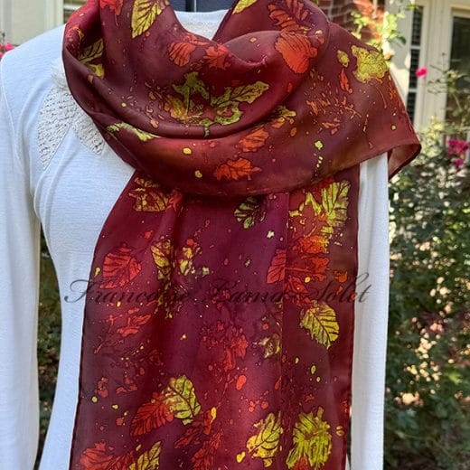 Women's hand painted batik silk scarf with leaf prints and fall colors