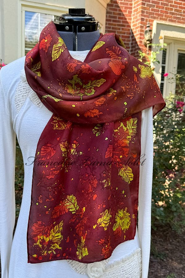 Women's hand painted batik silk scarf with leaf prints and fall colors