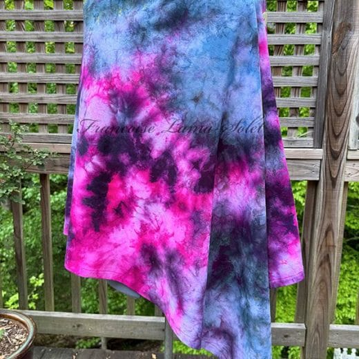 Women's poncho handmade and hand dyed in different shades of pink, purple and black.