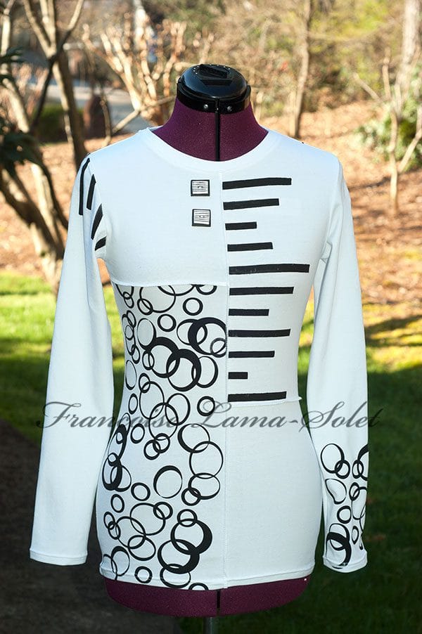 Women's handmade white and black long sleeve t-shirt, hand printed with bubbles and stripes patterns.