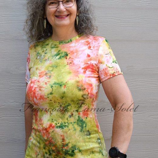 Stunning women's t-shirt handmade with ice dyed cotton jersey in different shades of greens and oranges.