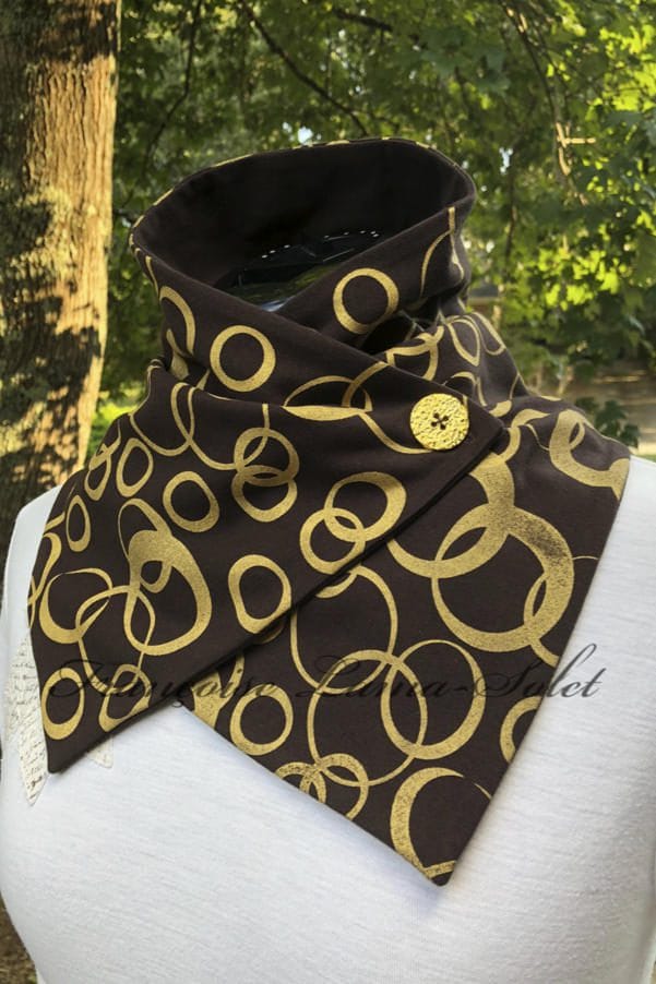 Women's brown neck scarf handmade and hand printed with a metallic gold bubble pattern.