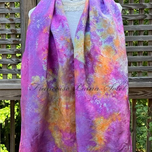 Stunning ice dyed silk scarf in different shades of purple, pink, coral, and more.