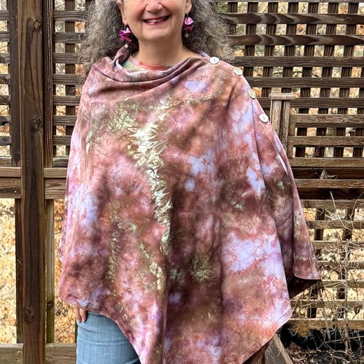 Unique women's handmade and hand dyed poncho in different shades of brown and lavender