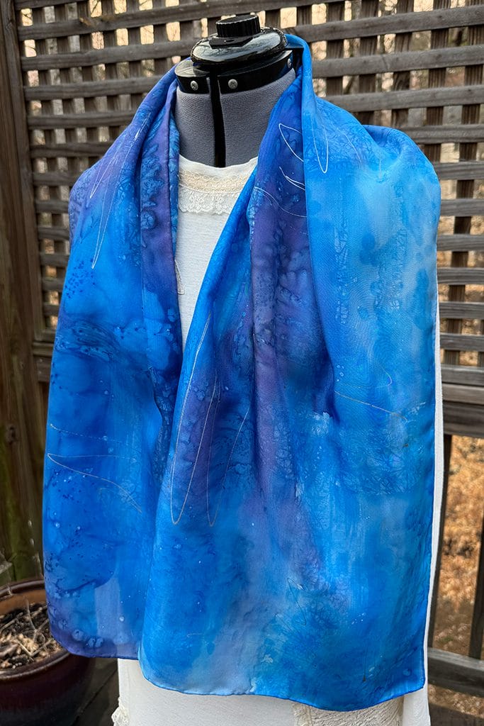 Women's abstract blue silk scarf hand painted using the batik technique