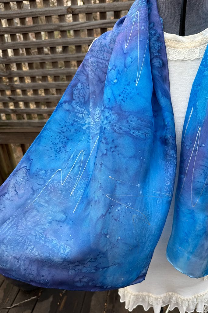 Women's abstract blue silk scarf hand painted using the batik technique