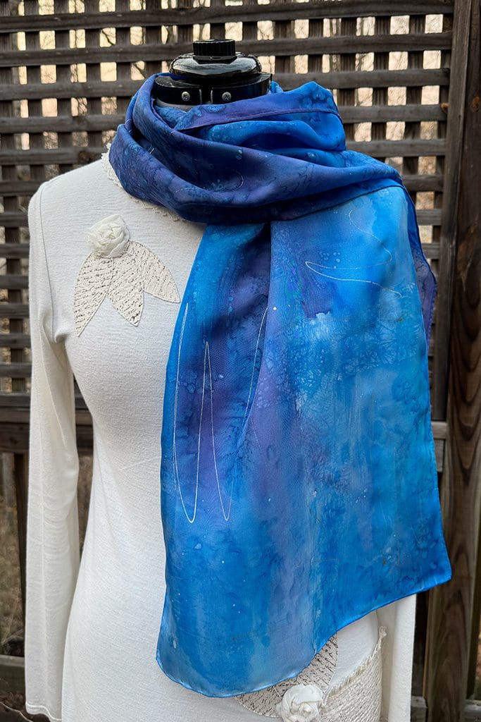 Women's abstract blue silk scarf hand painted using the batik technique