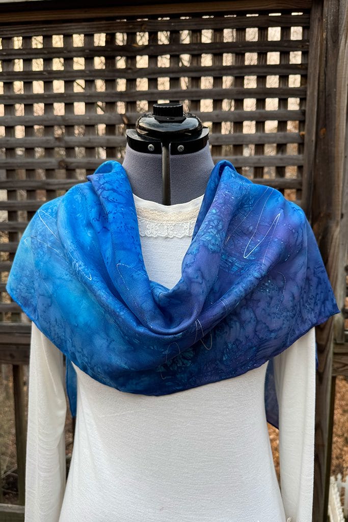 Women's abstract blue silk scarf hand painted using the batik technique