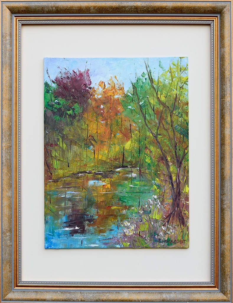 Original oil plein air painting of trees reflecting in a pond with autumnal color palette