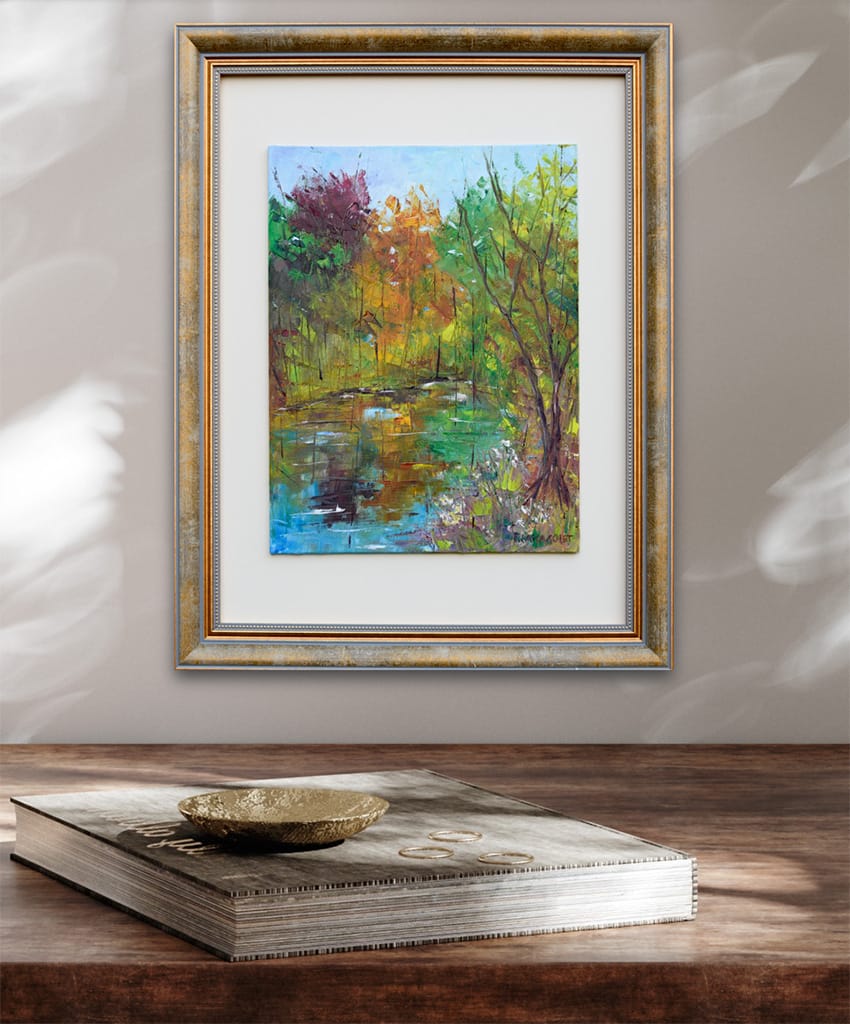 Original oil plein air painting of trees reflecting in a pond with autumnal color palette