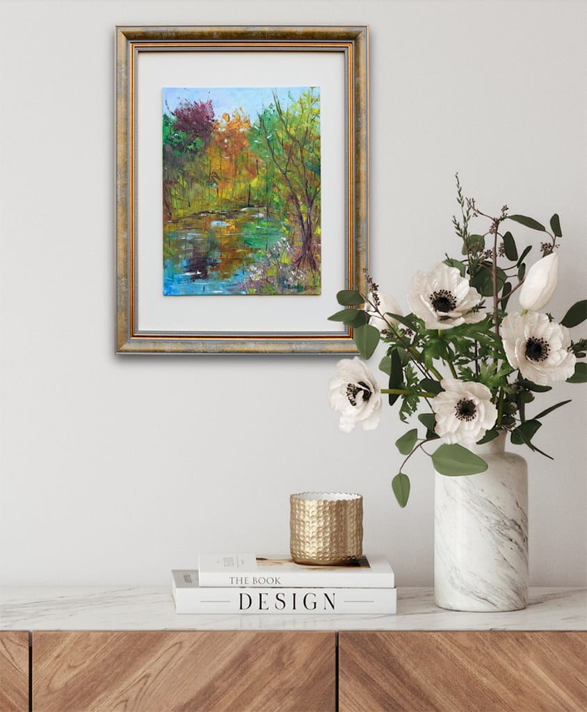 Original oil plein air painting of trees reflecting in a pond with autumnal color palette