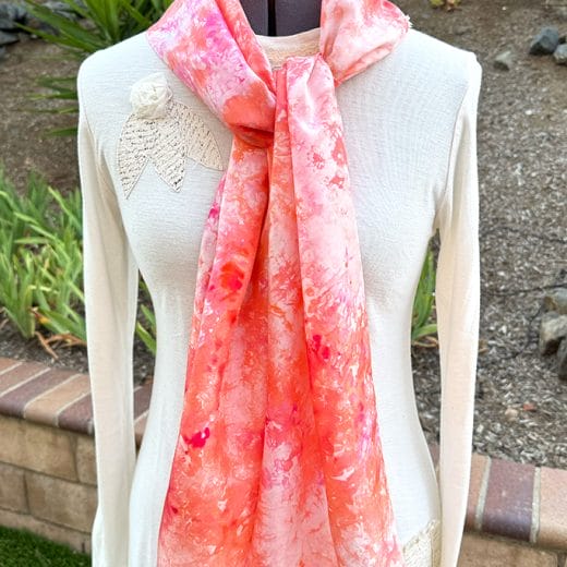 Women's wearable art coral and pink hand ice dyed silk scarf